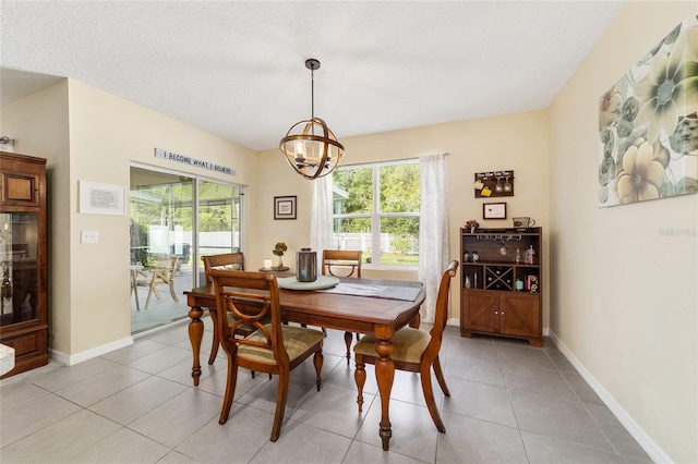 2552 NE 42nd Rd, Ocala, FL 34470 - dining room with a chandelier and light tile patterned floors
