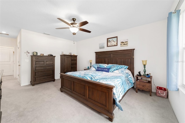 2552 NE 42nd Rd, Ocala, FL 34470 - bedroom featuring light carpet and a ceiling fan