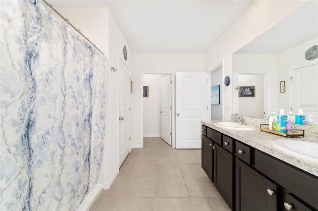 2552 NE 42nd Rd, Ocala, FL 34470 - full bathroom featuring double vanity, tile patterned floors, and a shower with shower curtain