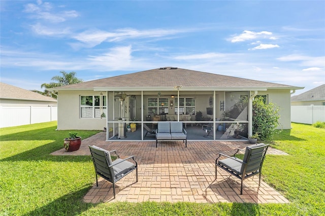 2552 NE 42nd Rd, Ocala, FL 34470 - rear view of house with a patio area, stucco siding, and a sunroom