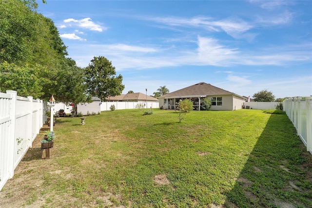 2552 NE 42nd Rd, Ocala, FL 34470 - fenced backyard featuring a storage shed