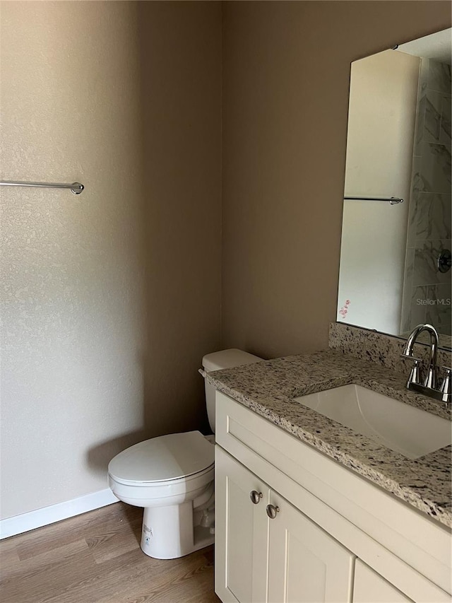 10375 SE 126th Ln, Belleview, FL 34420 - bathroom featuring vanity and wood finished floors