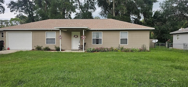 5591 NW 61st Ln, Ocala, FL 34482 - ranch-style home with a garage, driveway, and roof with shingles