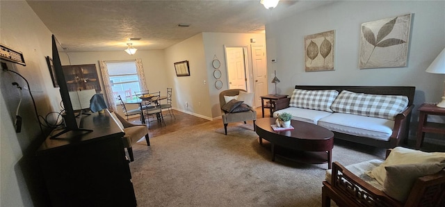 5591 NW 61st Ln, Ocala, FL 34482 - living room with carpet floors and a textured ceiling