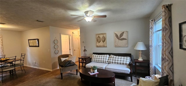 5591 NW 61st Ln, Ocala, FL 34482 - carpeted living room featuring a ceiling fan and a textured ceiling