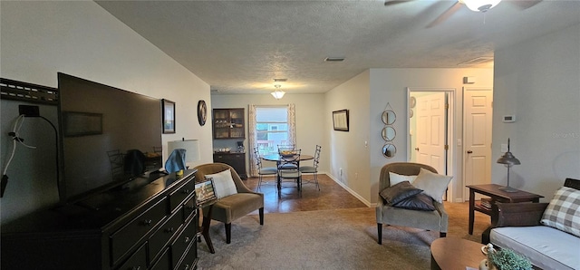 5591 NW 61st Ln, Ocala, FL 34482 - carpeted living room with a ceiling fan and a textured ceiling