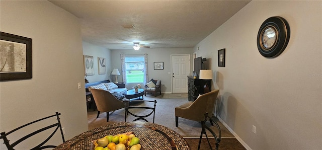 5591 NW 61st Ln, Ocala, FL 34482 - living room featuring carpet flooring and a ceiling fan