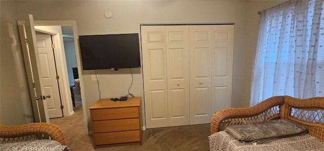 5591 NW 61st Ln, Ocala, FL 34482 - bedroom featuring a closet and dark carpet