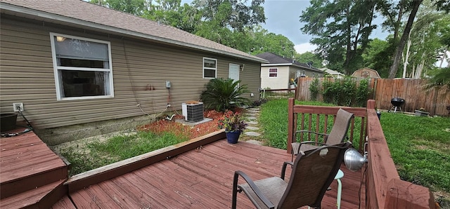 5591 NW 61st Ln, Ocala, FL 34482 - wooden deck featuring a fenced backyard