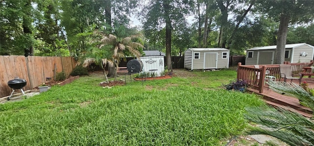 5591 NW 61st Ln, Ocala, FL 34482 - view of yard with a shed and view of wooded area