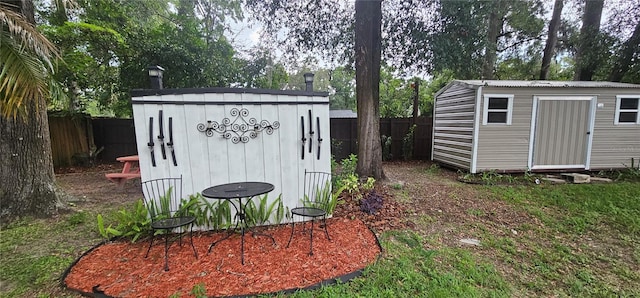5591 NW 61st Ln, Ocala, FL 34482 - view of shed with a fenced backyard