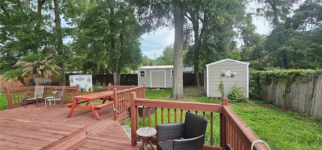 5591 NW 61st Ln, Ocala, FL 34482 - wooden deck with a storage unit, outdoor dining area, and a fenced backyard