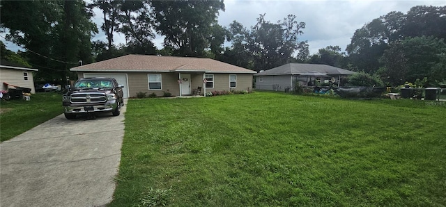 5591 NW 61st Ln, Ocala, FL 34482 - view of front of property with concrete driveway and a garage