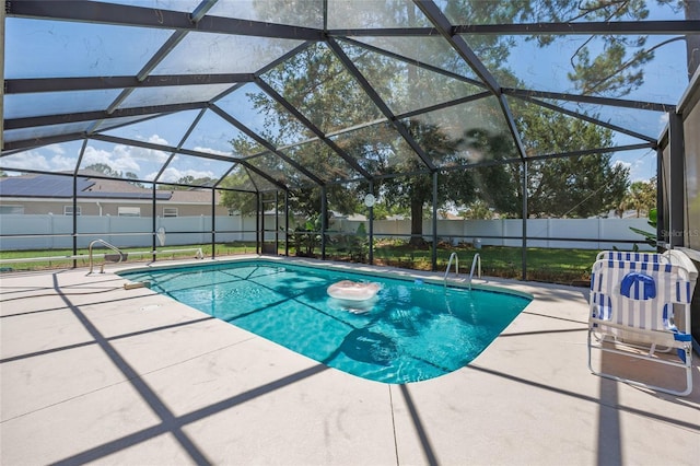 4300 NW 4th Cir, Ocala, FL 34475 - view of swimming pool with a patio, a fenced backyard, and a lanai
