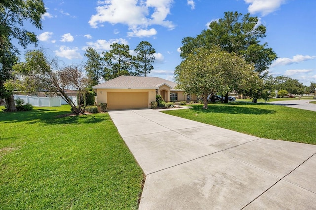 4300 NW 4th Cir, Ocala, FL 34475 - view of front of home with a garage, concrete driveway, and stucco siding