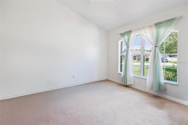 4300 NW 4th Cir, Ocala, FL 34475 - spare room with carpet and vaulted ceiling