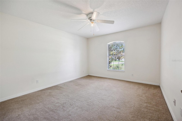 4300 NW 4th Cir, Ocala, FL 34475 - spare room featuring carpet and ceiling fan