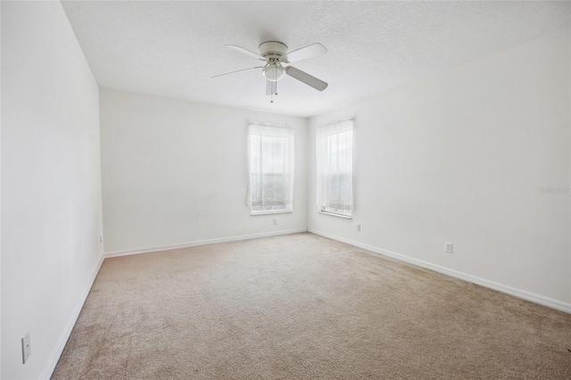 4300 NW 4th Cir, Ocala, FL 34475 - carpeted spare room featuring a ceiling fan and a textured ceiling