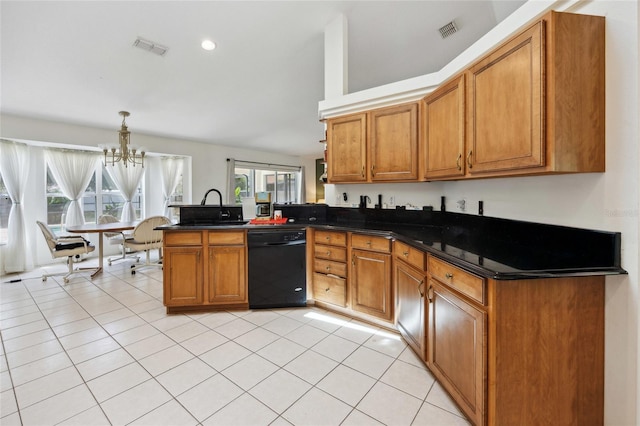 4300 NW 4th Cir, Ocala, FL 34475 - kitchen with dishwasher, a peninsula, dark countertops, a chandelier, and brown cabinets