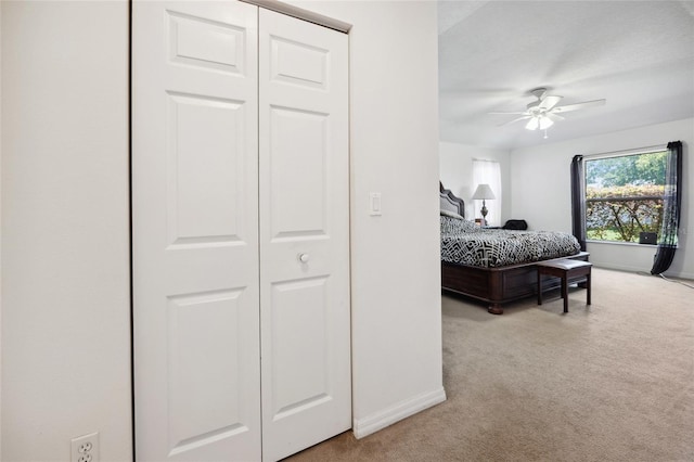 4300 NW 4th Cir, Ocala, FL 34475 - bedroom with carpet flooring and a ceiling fan