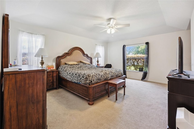 4300 NW 4th Cir, Ocala, FL 34475 - bedroom with light carpet and a ceiling fan