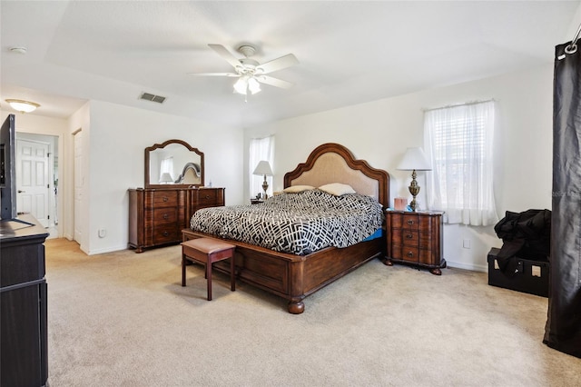 4300 NW 4th Cir, Ocala, FL 34475 - carpeted bedroom with baseboards and a ceiling fan