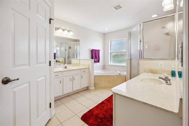 4300 NW 4th Cir, Ocala, FL 34475 - full bath with tile patterned floors, vanity, a stall shower, a bath, and recessed lighting