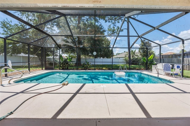 4300 NW 4th Cir, Ocala, FL 34475 - view of pool featuring a fenced backyard, a patio area, and glass enclosure