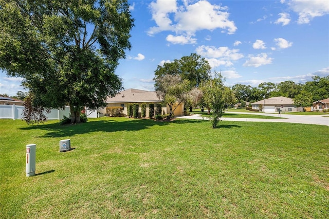 4300 NW 4th Cir, Ocala, FL 34475 - view of yard with concrete driveway and an attached garage