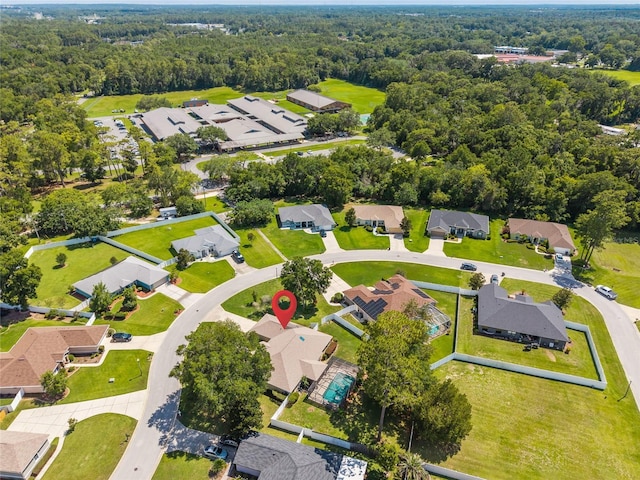 4300 NW 4th Cir, Ocala, FL 34475 - aerial view of residential area featuring a forest
