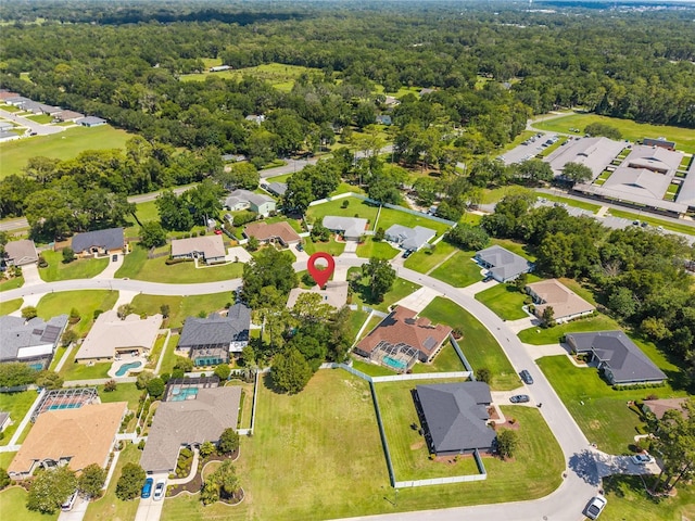 4300 NW 4th Cir, Ocala, FL 34475 - aerial overview of property's location featuring nearby suburban area and a forest
