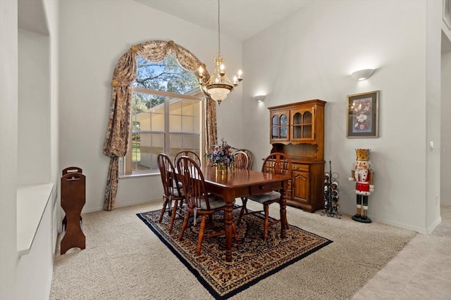 4322 N Mayan Dr, Hernando, FL 34442 - dining room featuring a chandelier and light carpet