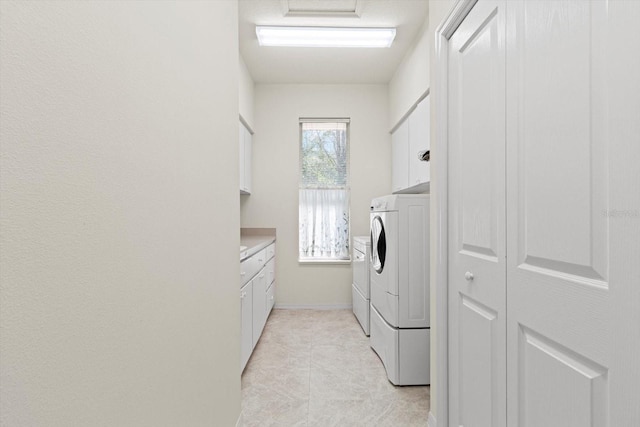 4322 N Mayan Dr, Hernando, FL 34442 - laundry room with washer and dryer, cabinet space, and light tile patterned floors