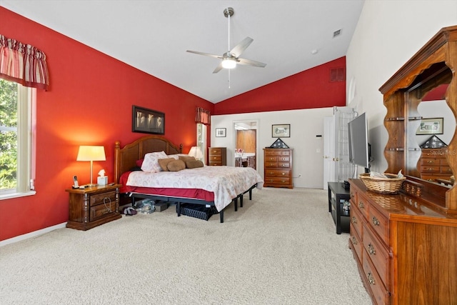 4322 N Mayan Dr, Hernando, FL 34442 - bedroom featuring light colored carpet, lofted ceiling, and connected bathroom