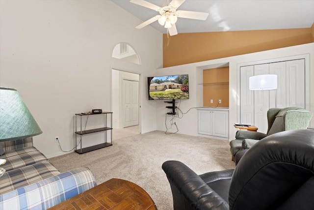 4322 N Mayan Dr, Hernando, FL 34442 - living room featuring light carpet, a ceiling fan, and high vaulted ceiling