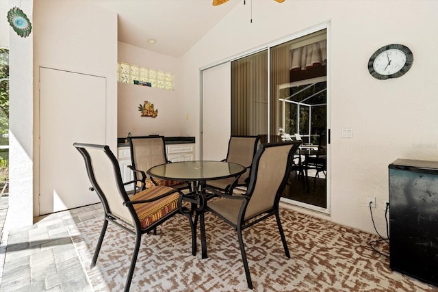 4322 N Mayan Dr, Hernando, FL 34442 - dining space with a ceiling fan, vaulted ceiling, and healthy amount of natural light