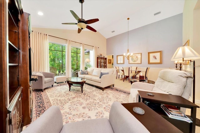 814 Copperhead Cir, Saint Augustine, FL 32092 - living room with ceiling fan, lofted ceiling, and a chandelier