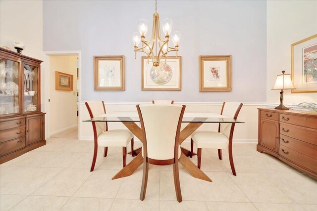 814 Copperhead Cir, Saint Augustine, FL 32092 - dining space with a chandelier, light tile patterned flooring, and a high ceiling