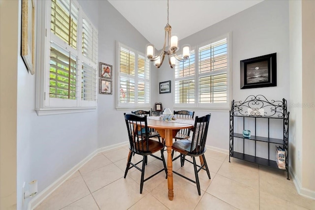 814 Copperhead Cir, Saint Augustine, FL 32092 - dining area featuring a chandelier, light tile patterned floors, and vaulted ceiling