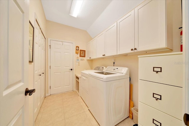 814 Copperhead Cir, Saint Augustine, FL 32092 - laundry room featuring cabinet space, washing machine and clothes dryer, and light tile patterned floors