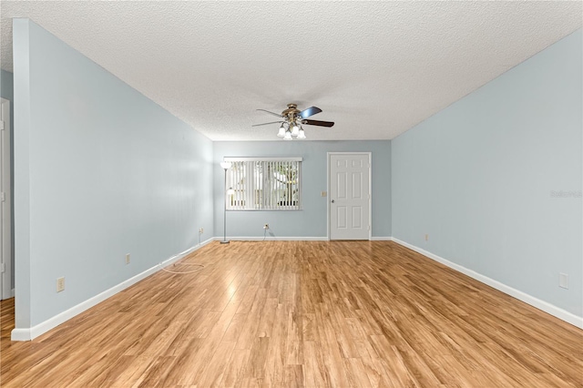 8400 SW 90th St Unit C, Ocala, FL 34481 - spare room with a ceiling fan, light wood-style flooring, and a textured ceiling