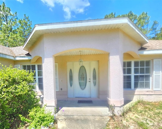 15483 Penn State Rd, Weeki Wachee, FL 34614 - entrance to property featuring stucco siding