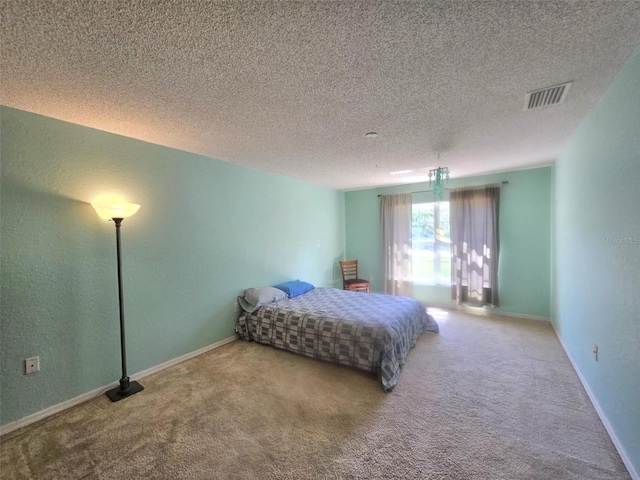 15483 Penn State Rd, Weeki Wachee, FL 34614 - bedroom featuring carpet flooring and a textured ceiling