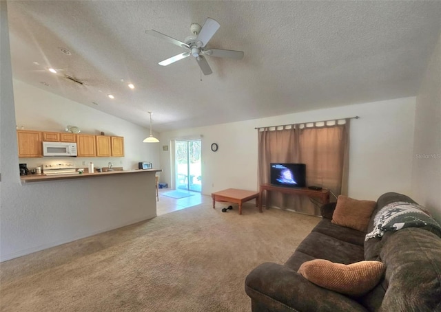 15483 Penn State Rd, Weeki Wachee, FL 34614 - living room with a textured ceiling, light carpet, ceiling fan, and vaulted ceiling