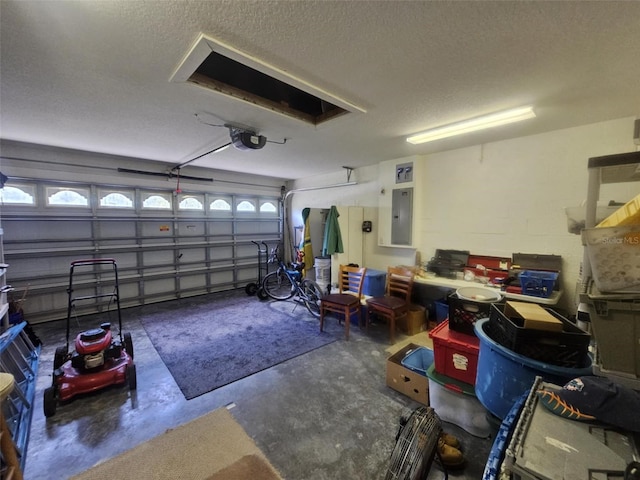 15483 Penn State Rd, Weeki Wachee, FL 34614 - garage featuring electric panel and a garage door opener