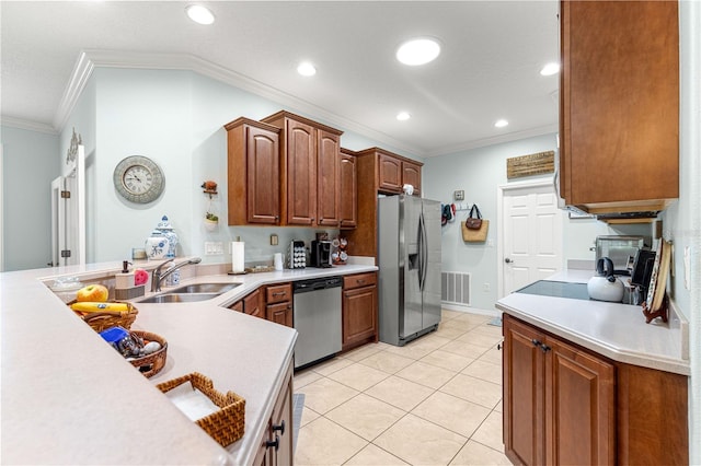 8566 SW 83rd Loop, Ocala, FL 34481 - kitchen with stainless steel appliances, crown molding, light countertops, recessed lighting, and light tile patterned flooring