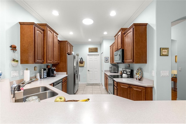 8566 SW 83rd Loop, Ocala, FL 34481 - kitchen featuring stainless steel appliances, ornamental molding, light countertops, brown cabinetry, and recessed lighting