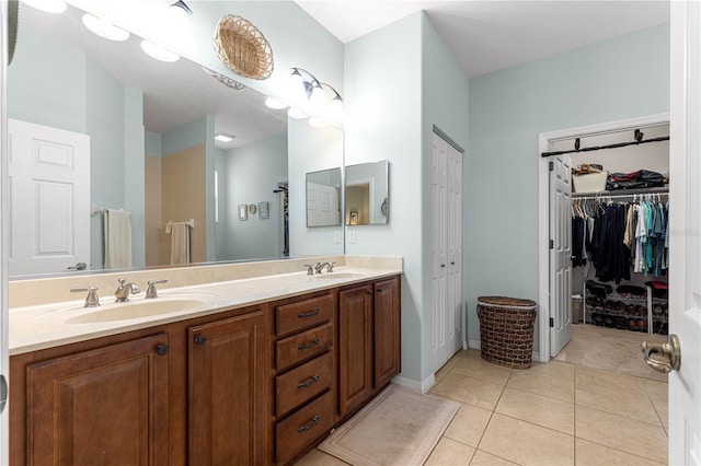 8566 SW 83rd Loop, Ocala, FL 34481 - full bath featuring double vanity, tile patterned floors, and a spacious closet