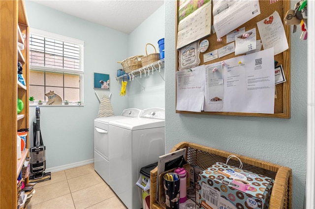 8566 SW 83rd Loop, Ocala, FL 34481 - washroom with washing machine and dryer and light tile patterned flooring