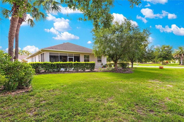 8566 SW 83rd Loop, Ocala, FL 34481 - view of front of home featuring stucco siding and a front yard